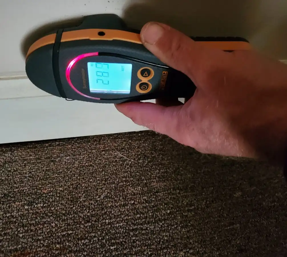 Moisture detection at baseboard during Sewage Cleanup & Sanitation in Conewago